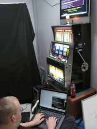 "Kyle working on the slot machine."